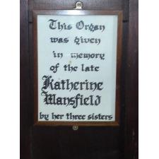 Plaque on side of organ in St Michael's Church, Duntisbourne Rous.